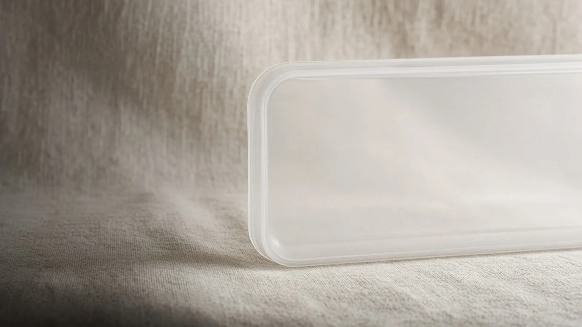 The plain base of a clear plastic container