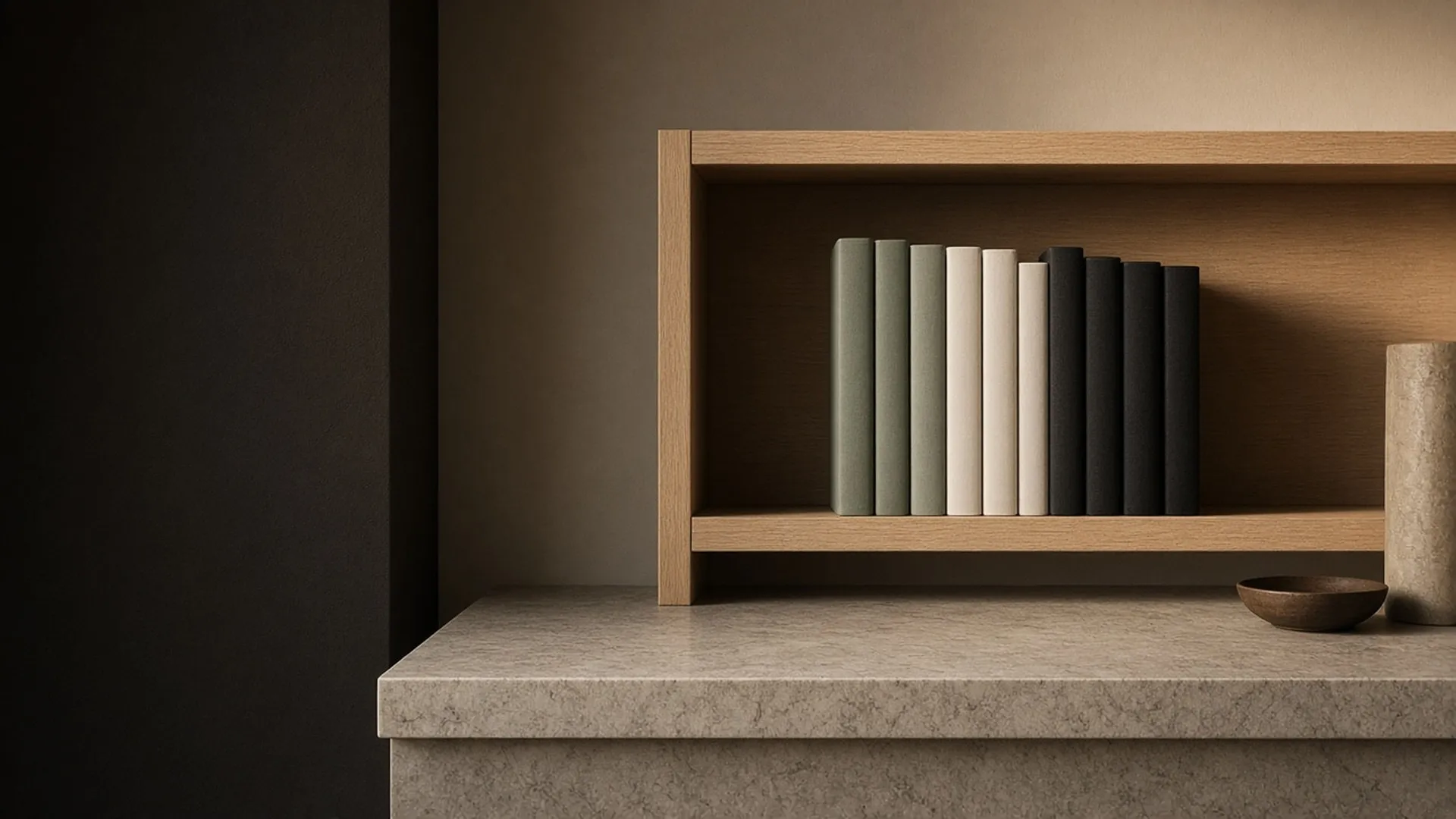 A shelf of plain books in a kitchen