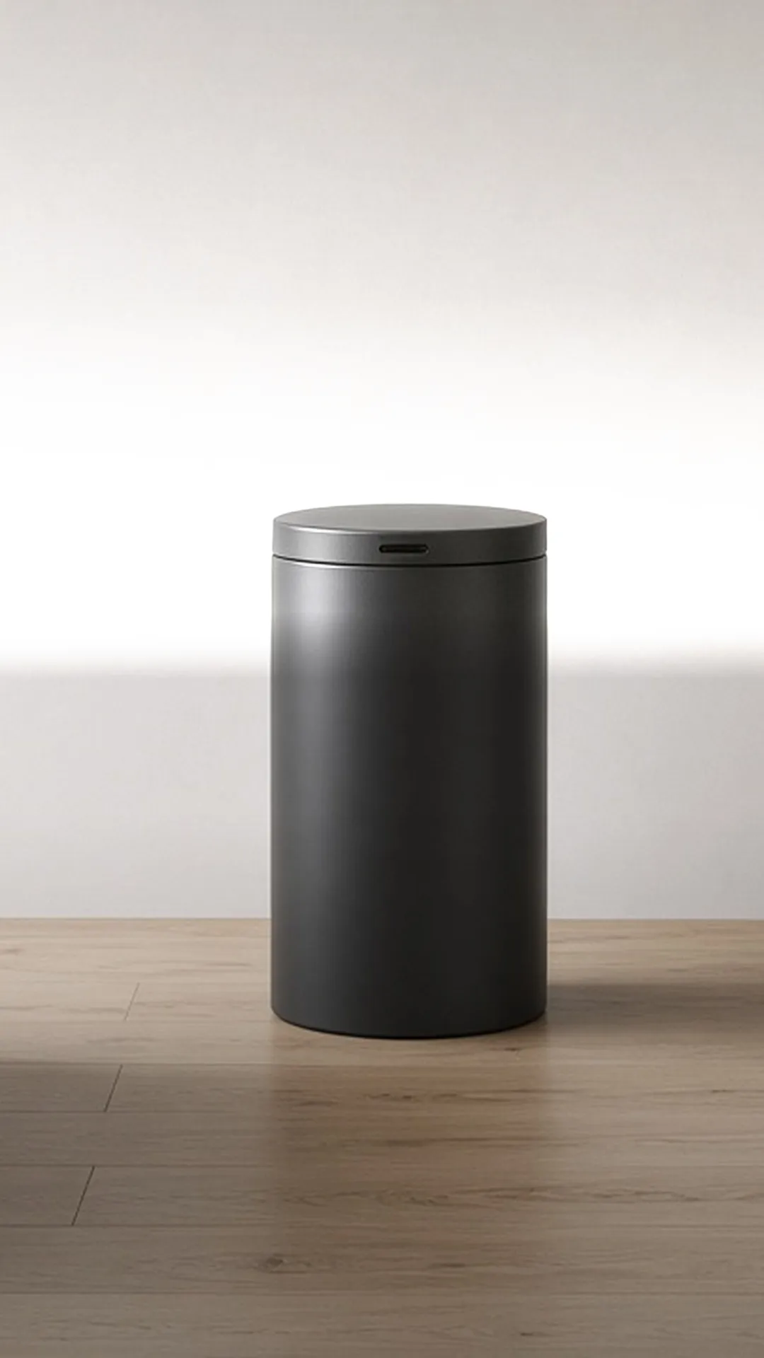 A matte charcoal touchless can in a modern kitchen