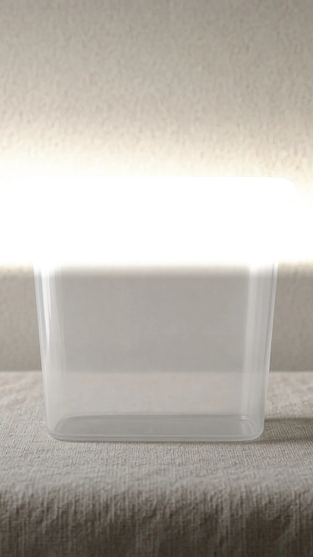 The plain base of a clear plastic container